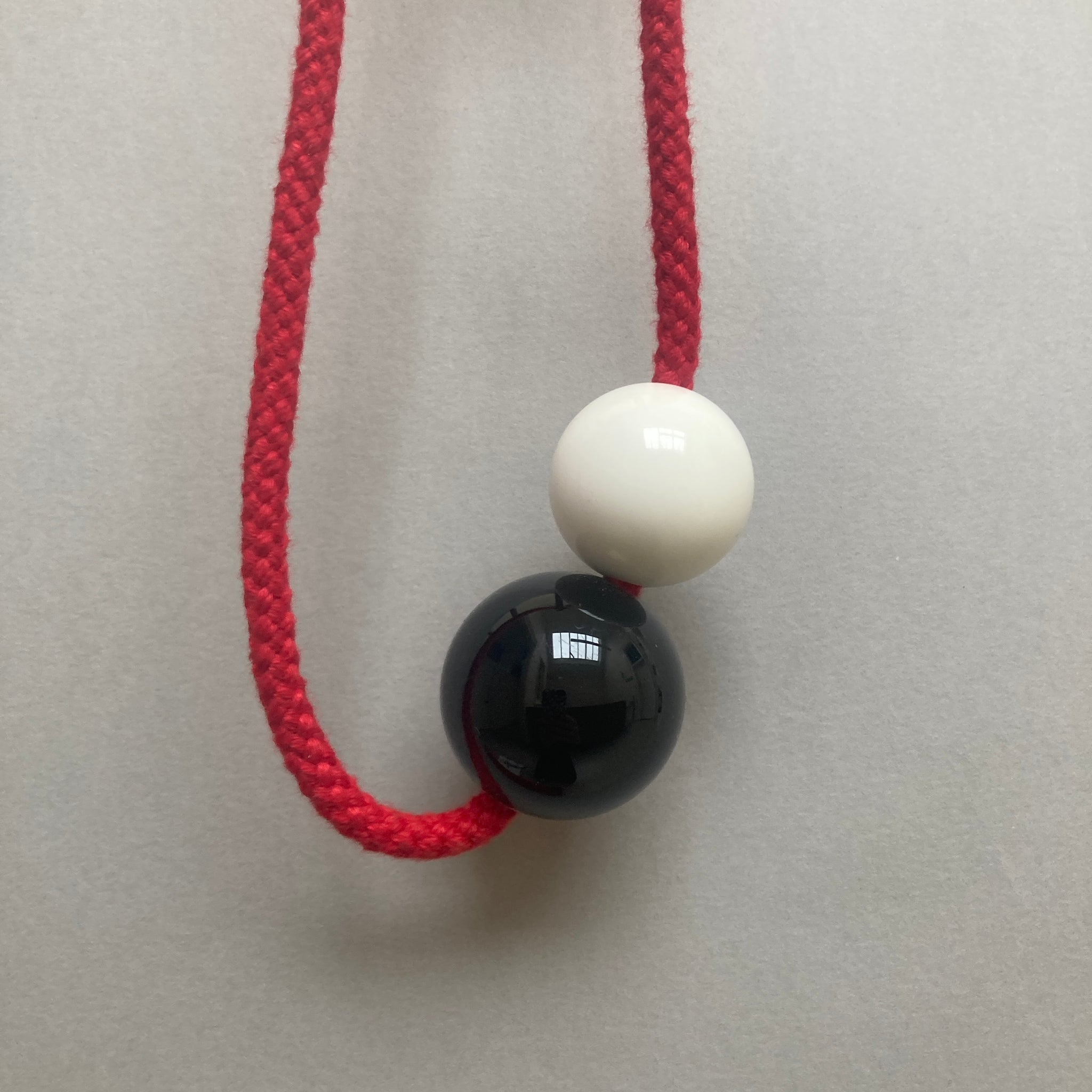 Sample necklace on red cord