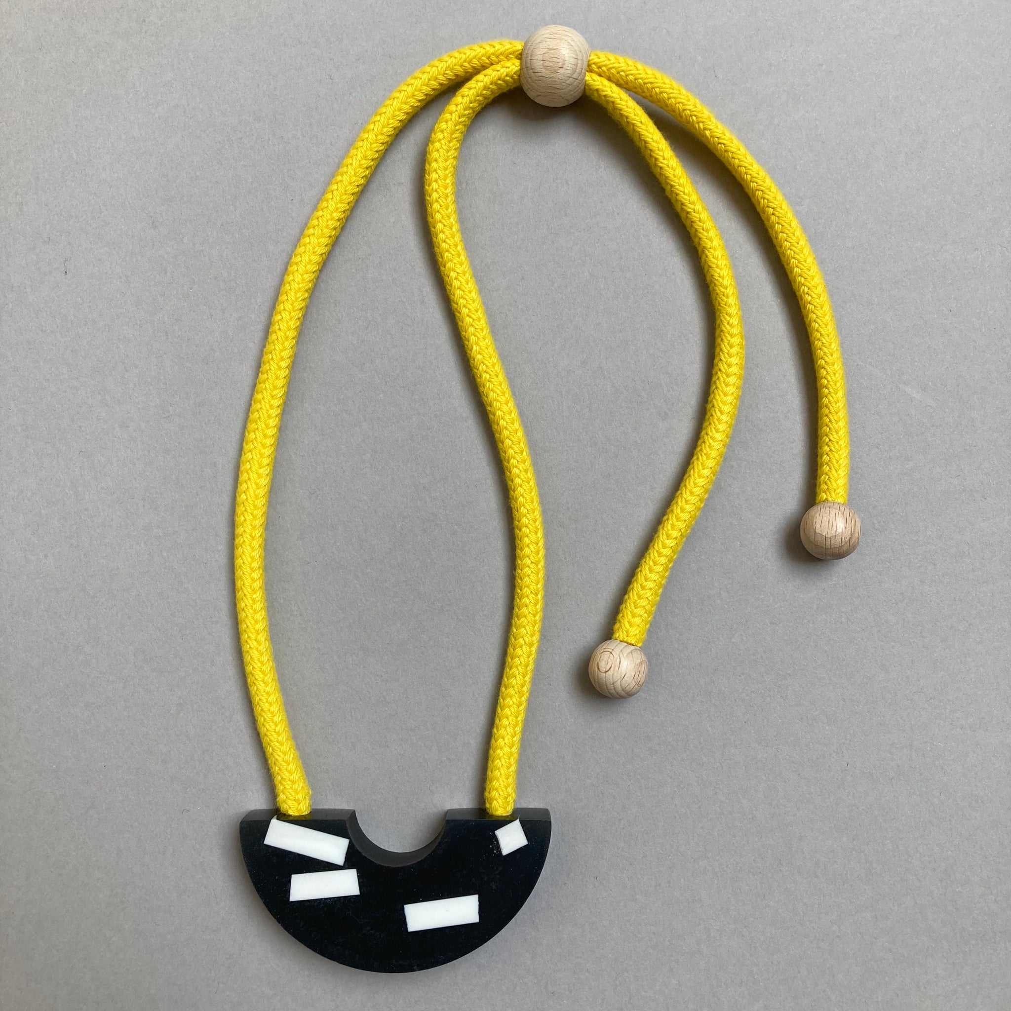 Sample Ito necklace on yellow rope